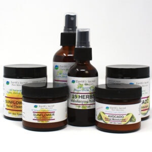 2 oz and 4 oz glass jars and spray bottles of Cleaner, Toner, and Moisturizer for dry skin types